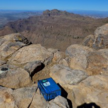 Summit of 1541 meters high Superstition Peak with Ridgeline and Flatiron in the background
